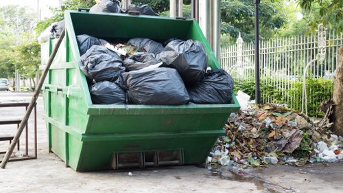 Professional team handling waste removal